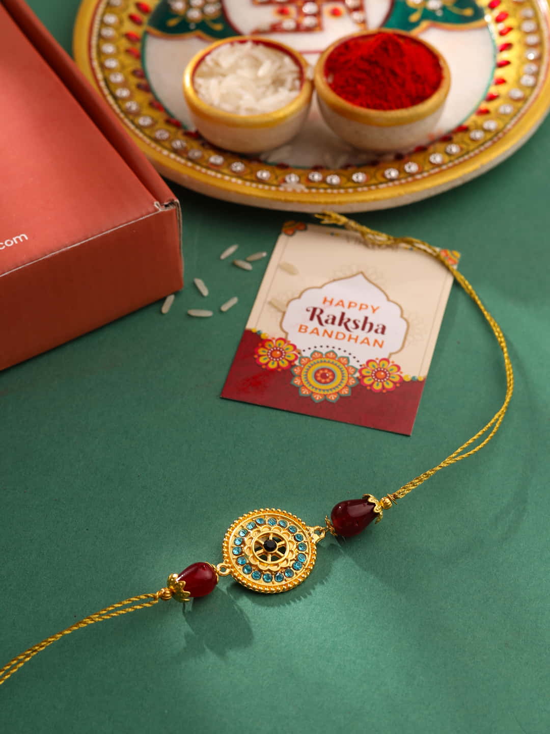 Gold-Plated Stone and Pearl Studded Rakhi For Brother