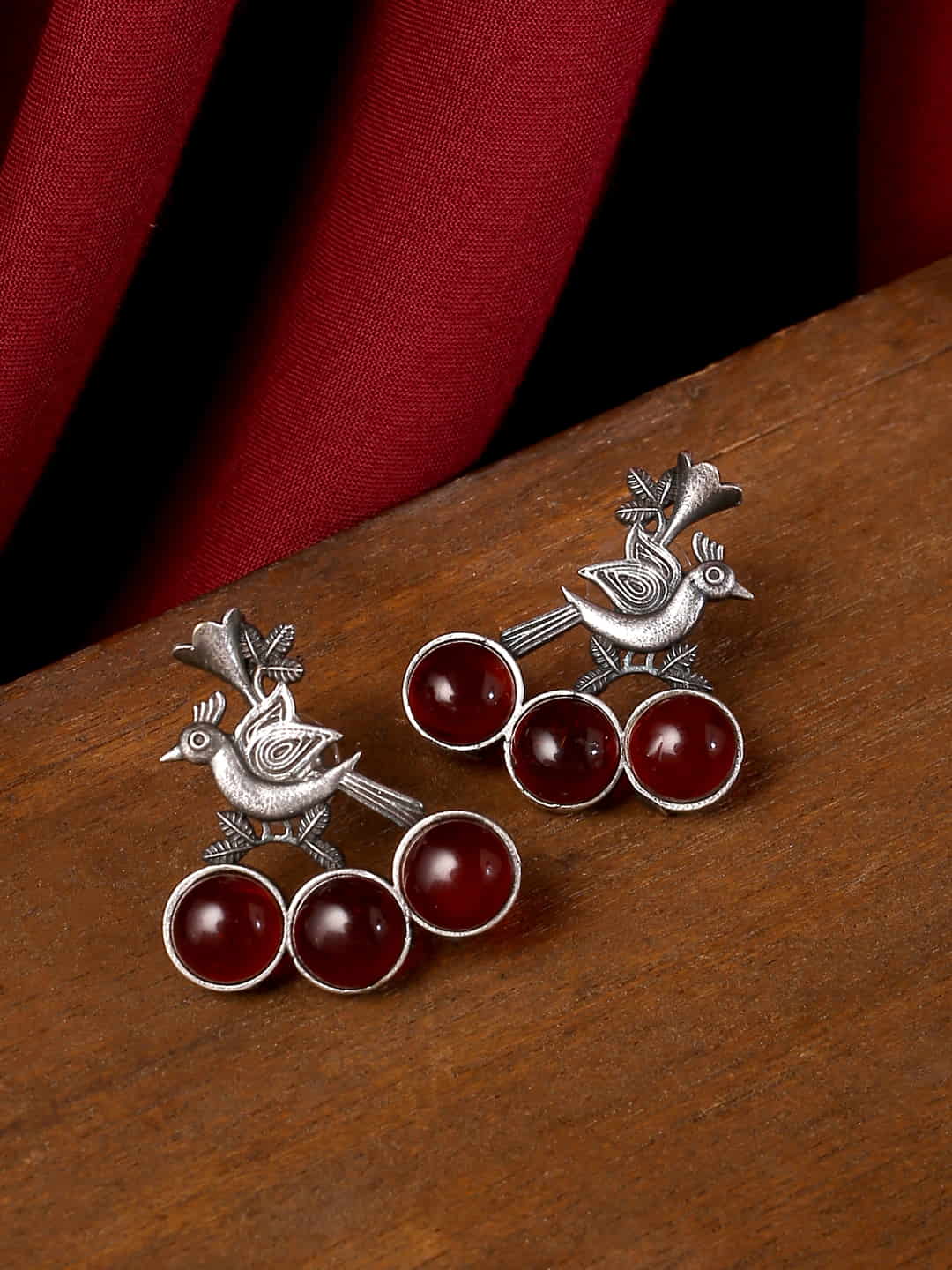 peacock-shape-oxidized-earrings-with-red-stone-viraasi