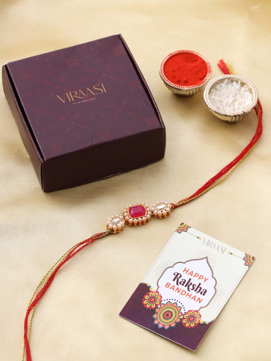 Red and Gold-Toned Kundan Pearl Rakhi for Brother